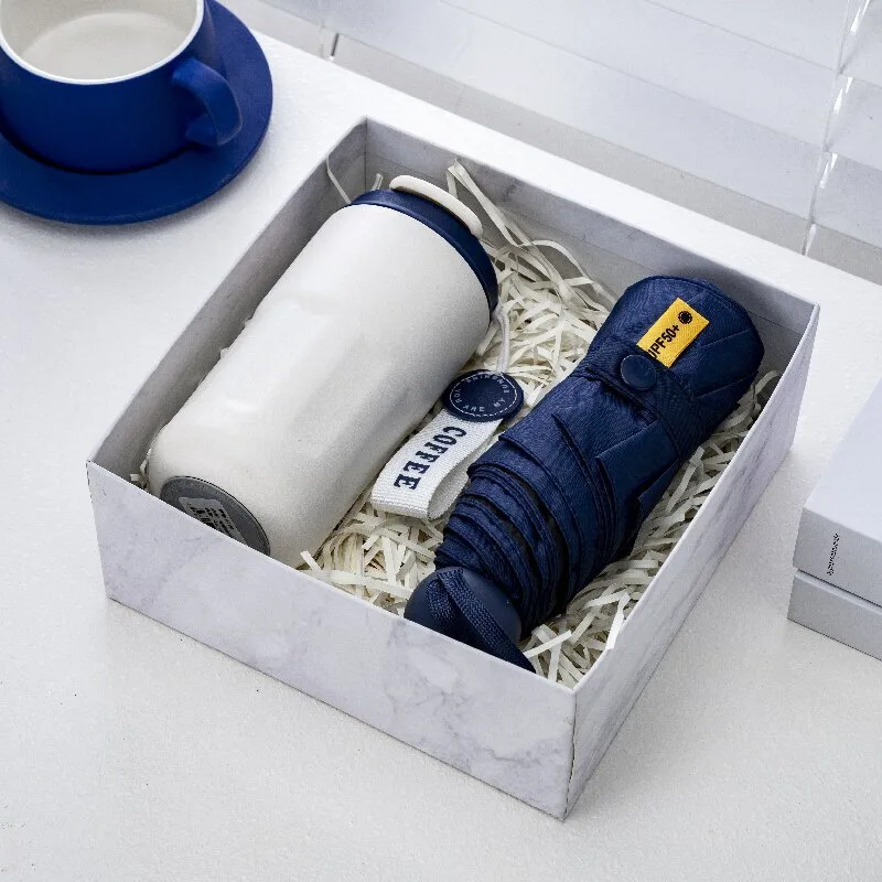 Coffret cadeau parapluie et mug de voyage